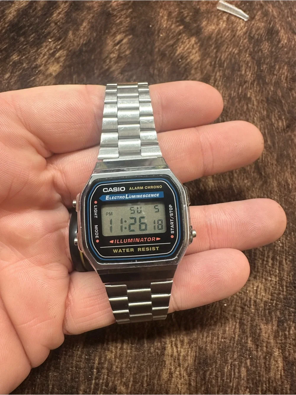Casio Silver Stainless Steel Digital Watch with Black Dial Accents